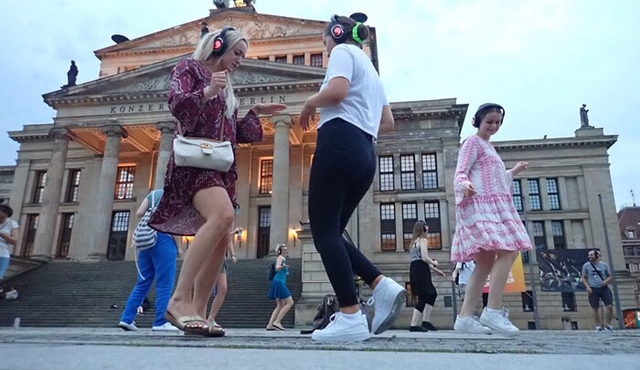 Silent disco through downtown Berlin with flash mobs