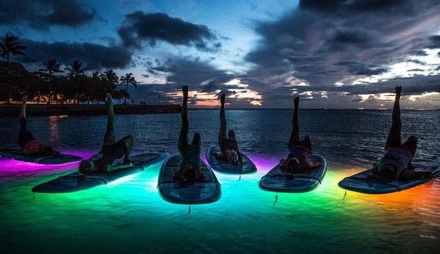 Night SUP Yoga in Honolulu, Hawaii