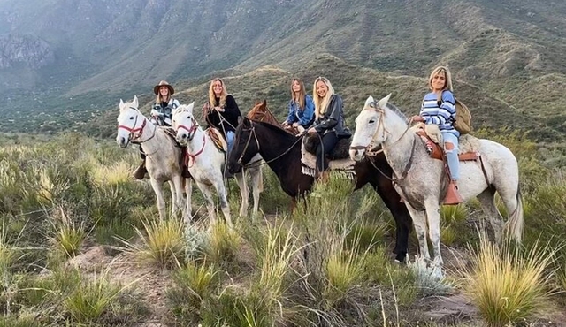 Horseback riding at sunset